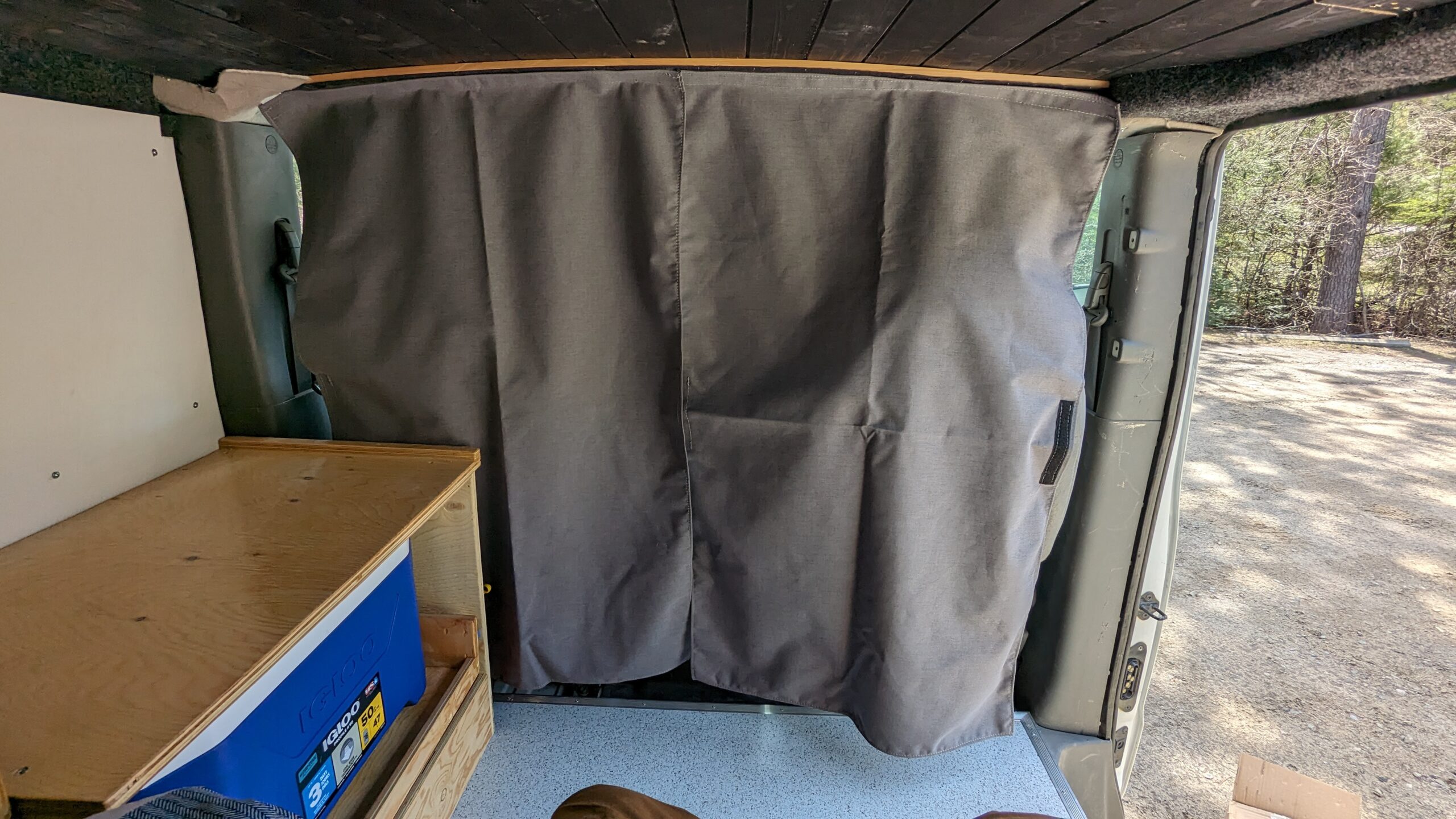 Removable opaque curtains to separate the sleeping area